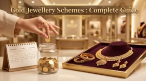Gold jewellery displayed with coins and a savings jar, representing a jewellery gold scheme as a way to buy jewellery, not an investment